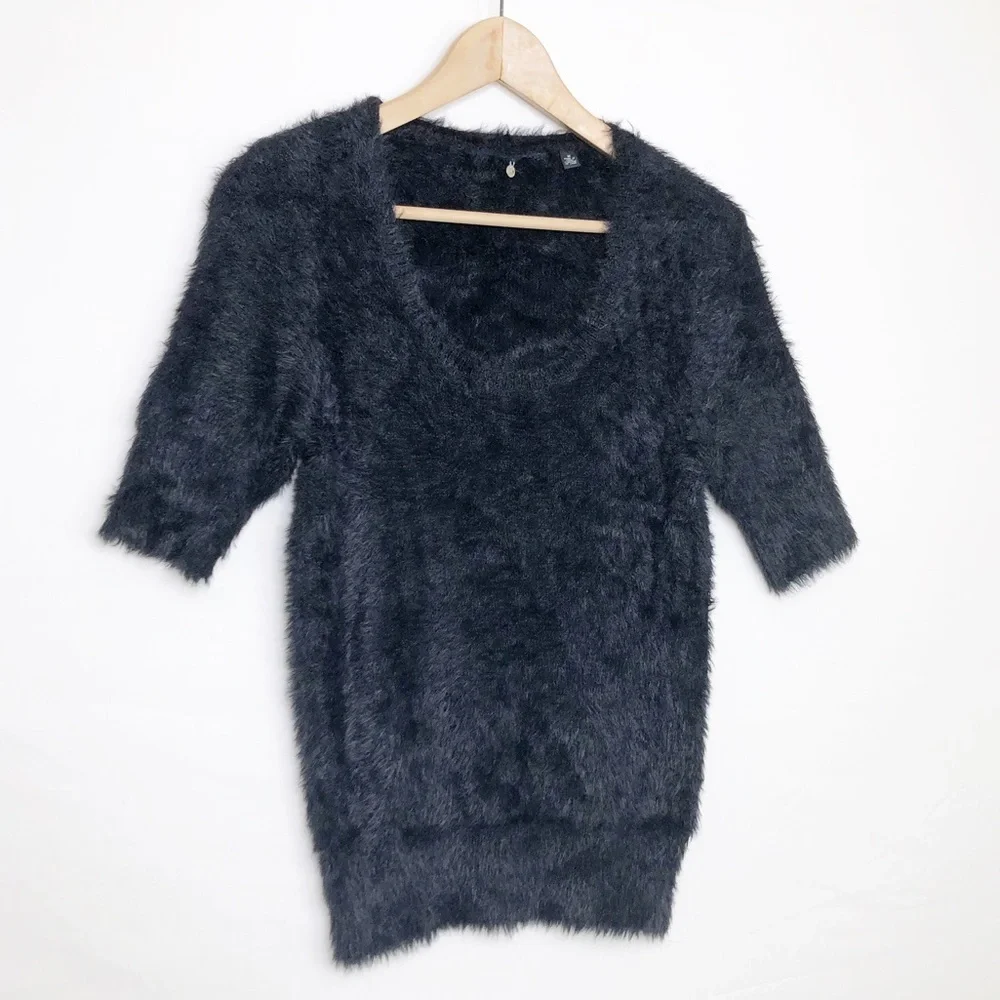 Knitted and knotted black, eyelash, scoop, neck sweater
